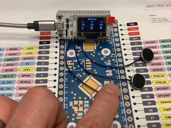 ESP32 Capacitive Touch Input Using Metallic Hole Plugs for Buttons