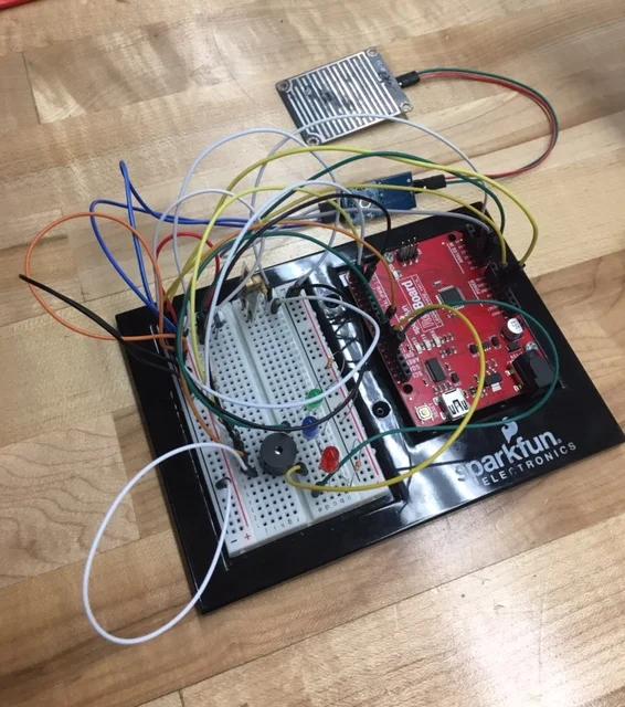 Using Temperature Rainwater and Vibration Sensors on an Arduino to Protect Railways