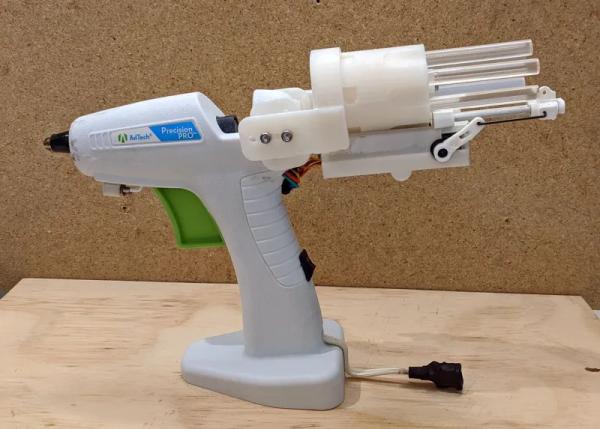 QUICK RELOAD FOR YOUR GLUE STICKS THE GLUE GUN SIX SHOOTER