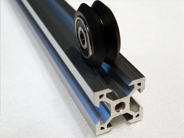 Aluminum V-Slot extrusion with roller wheel
